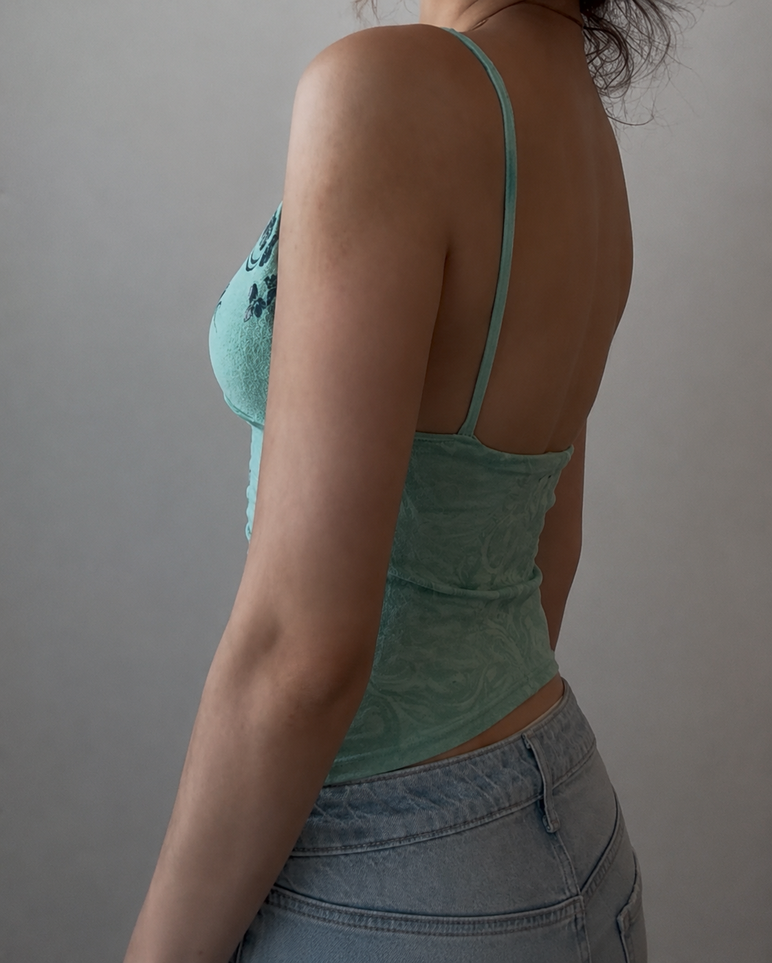 Green Top with Unique Design, Sequins, and Ruffled Straps