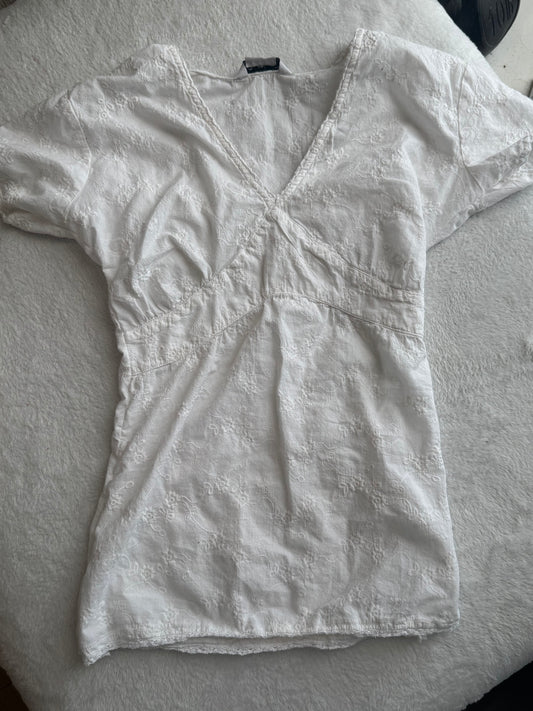 White Top with Embroidered Design