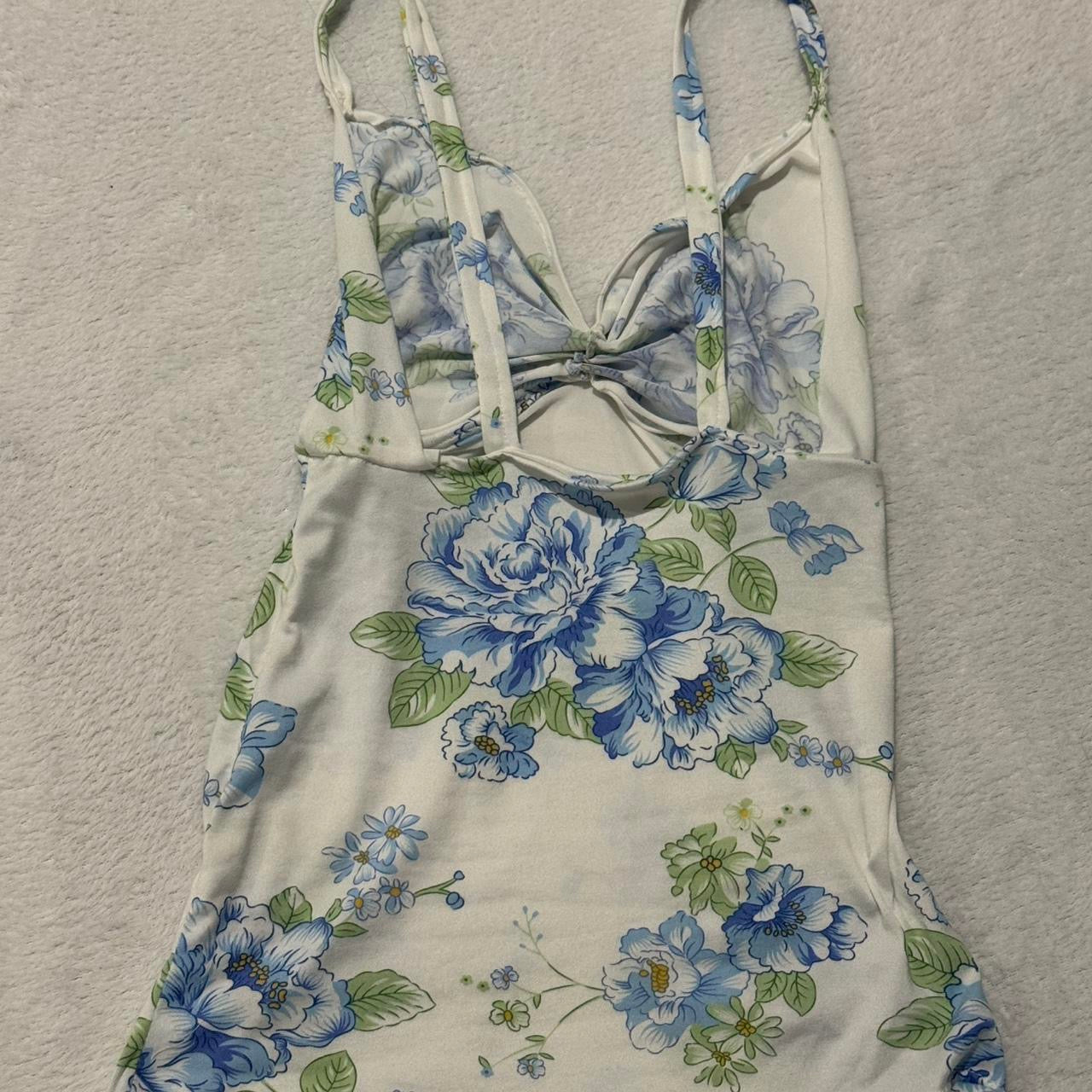 White Top with Blue and Green Floral Pattern