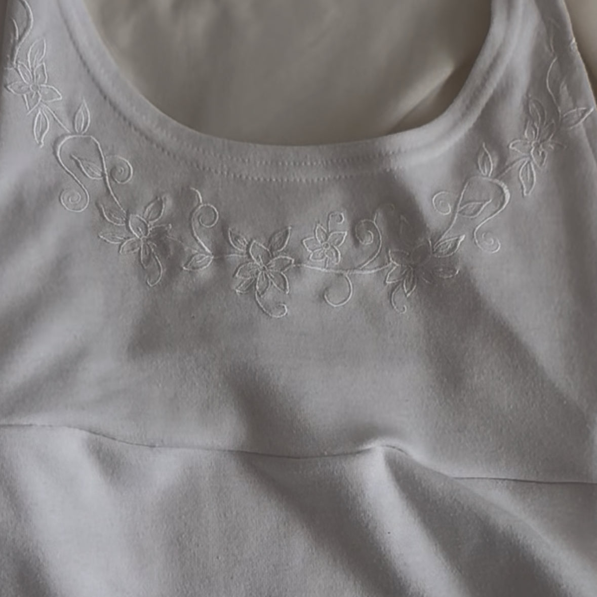 Fitted White Top with Floral Embroidery